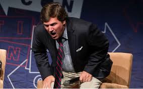 Tucker Carlson can’t control his rage as MAGA student resurrects CIA conspiracy theory about his father